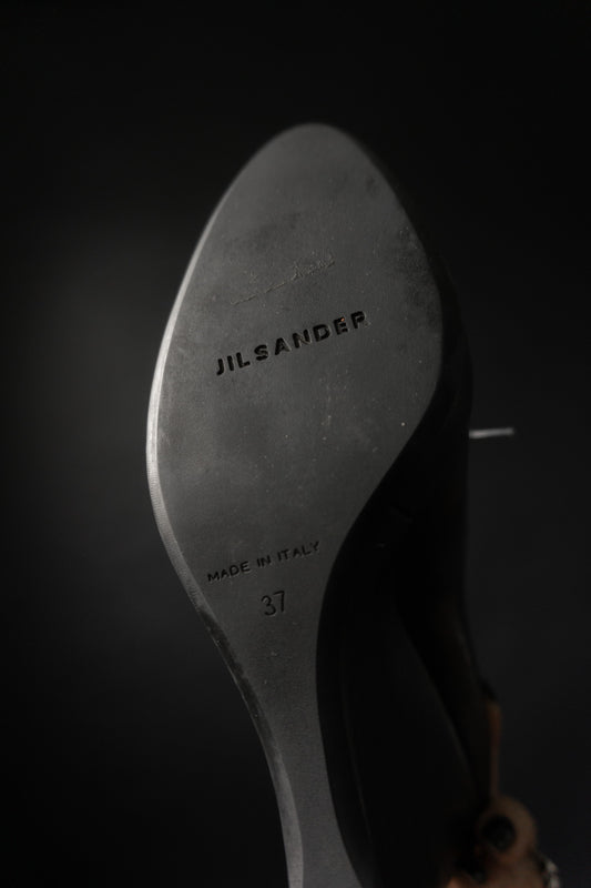 Vintage Jil Sander Ankle Boots aus schwarzem Leder mit Keilabsatz – zeitlose Y2K-Ästhetik.
