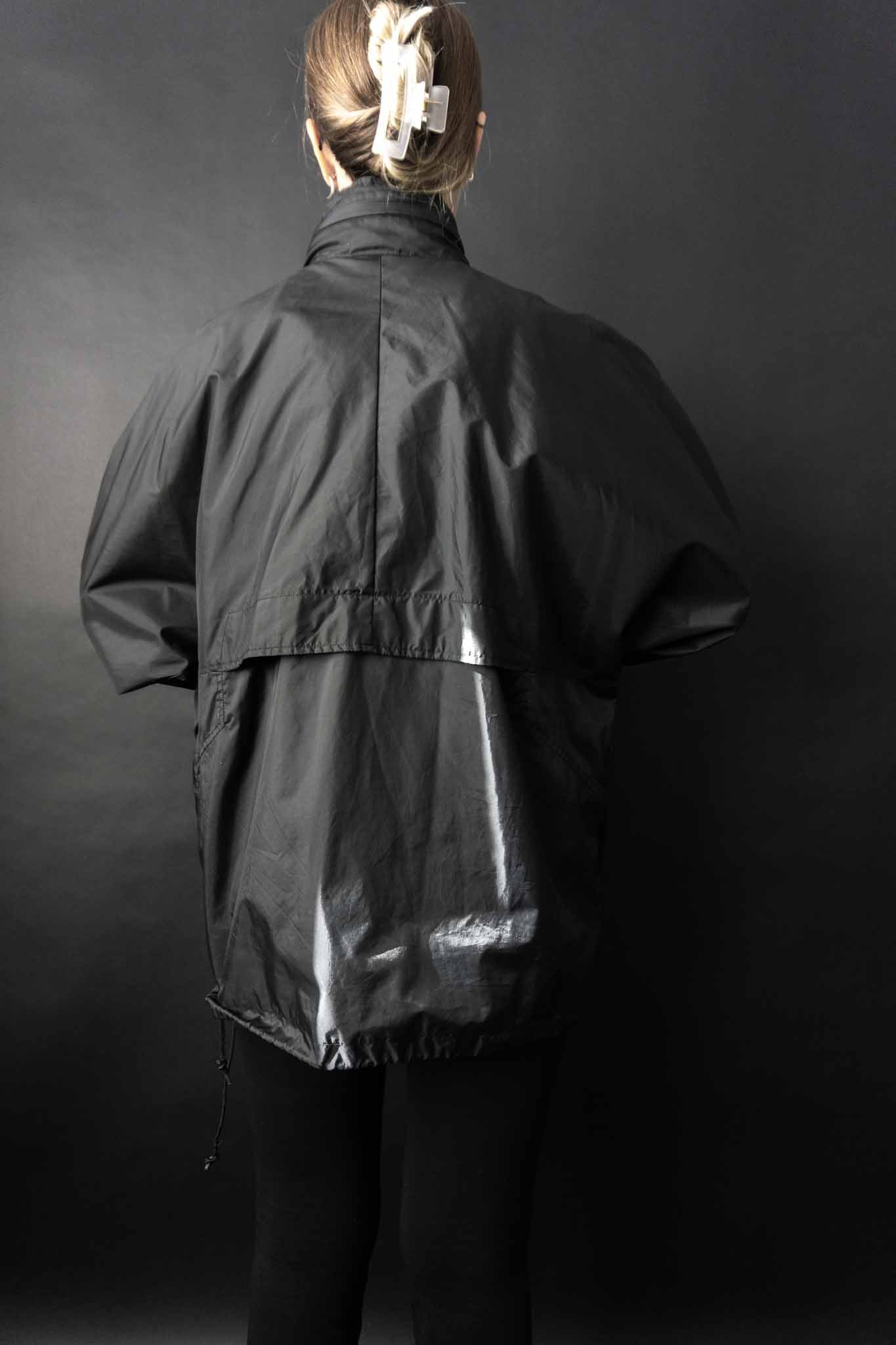 Schwarzer vintage Windbreaker aus Nylon in oversized Schnitt der 90er Jahre