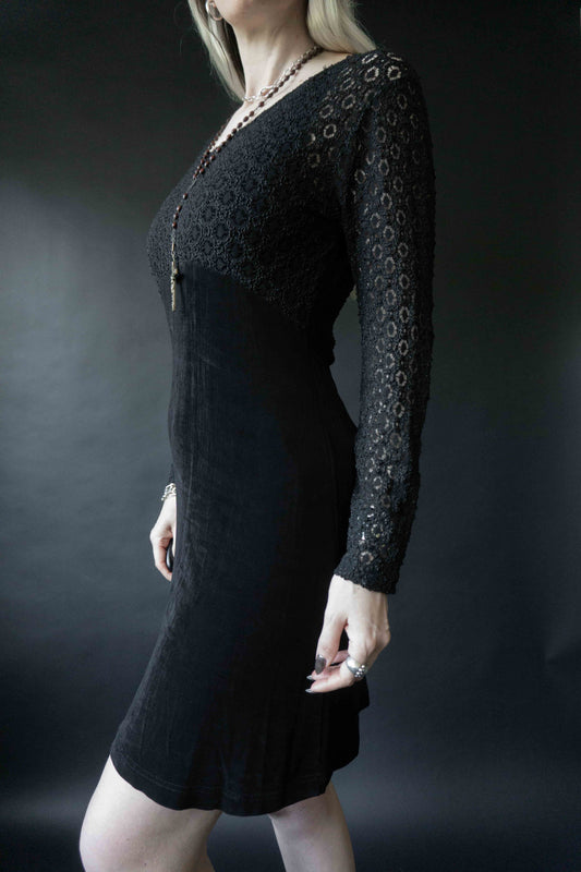 Schwarzes Vintagekleid mit Spitzentop und ausgestelltem Rock