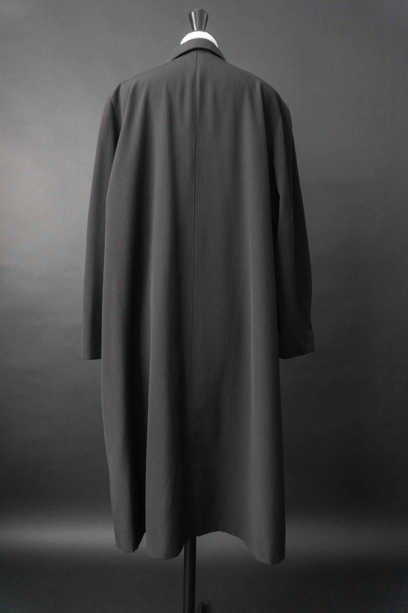 Schwarzer fließender Vintage Mantel mit verdeckter Knopfleiste