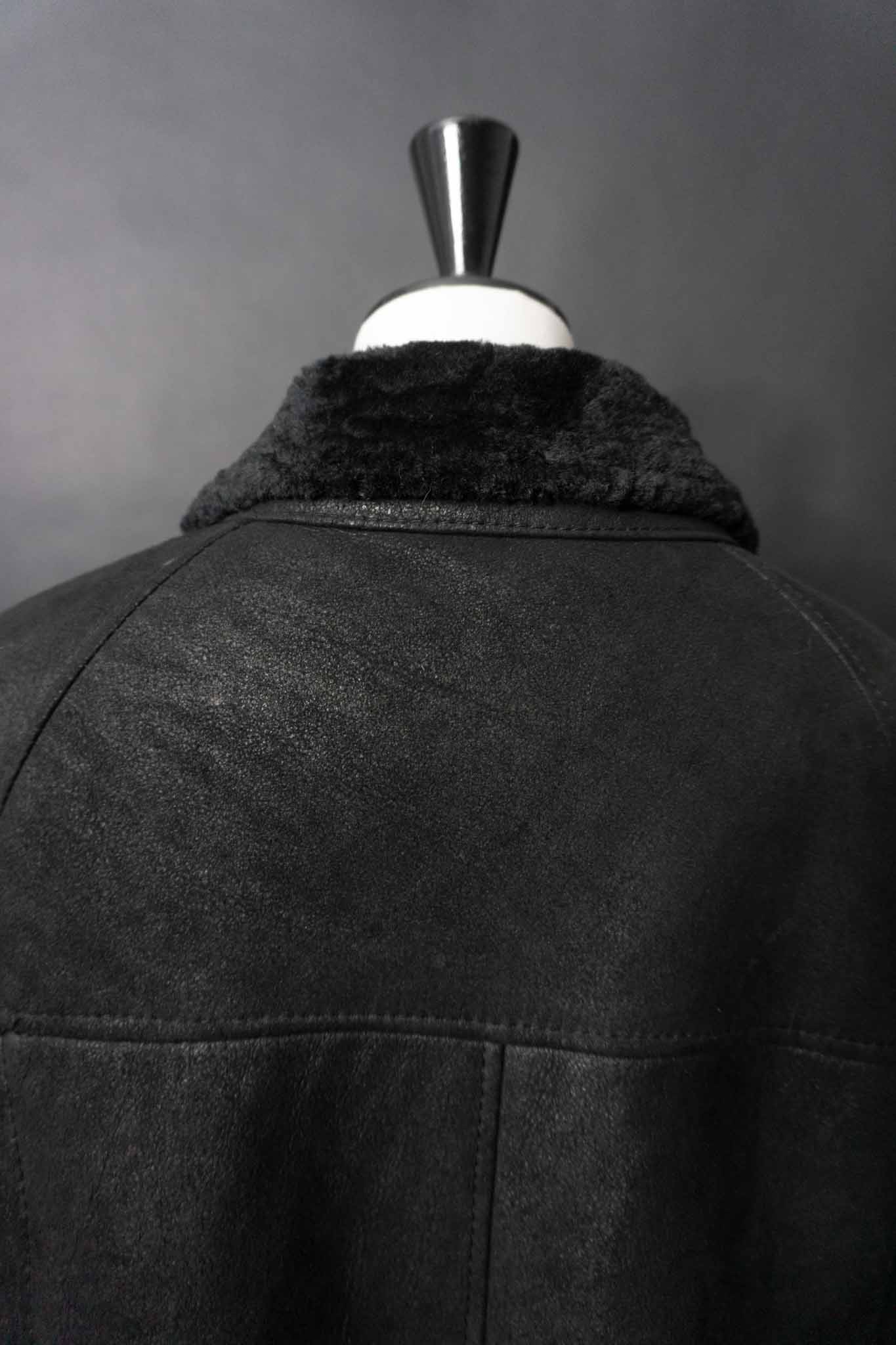 Vintage schwarzer Shearling Lammfellmantel aus echtem Lammfell – federleicht und warm