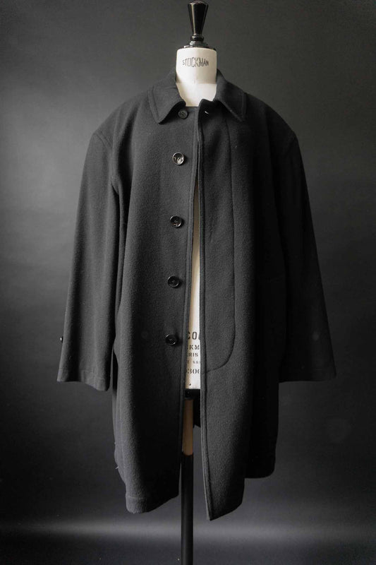 Schwarzer Vintage Wollmantel aus den 80ern mit Knopfleiste