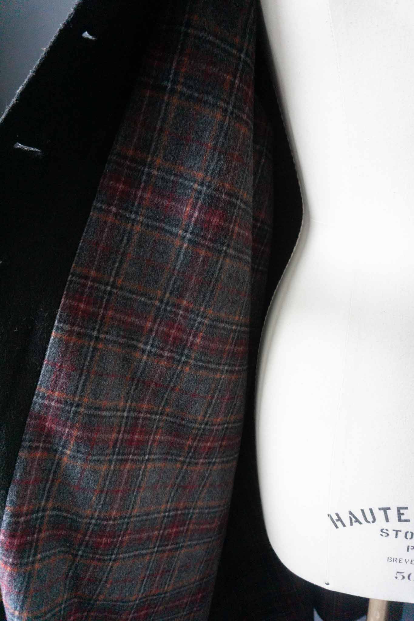 Schwarzer Vintage-Mantel von Kemper aus den 70ern mit Rückenklappe und langer Knopfleiste, aus Wollmix