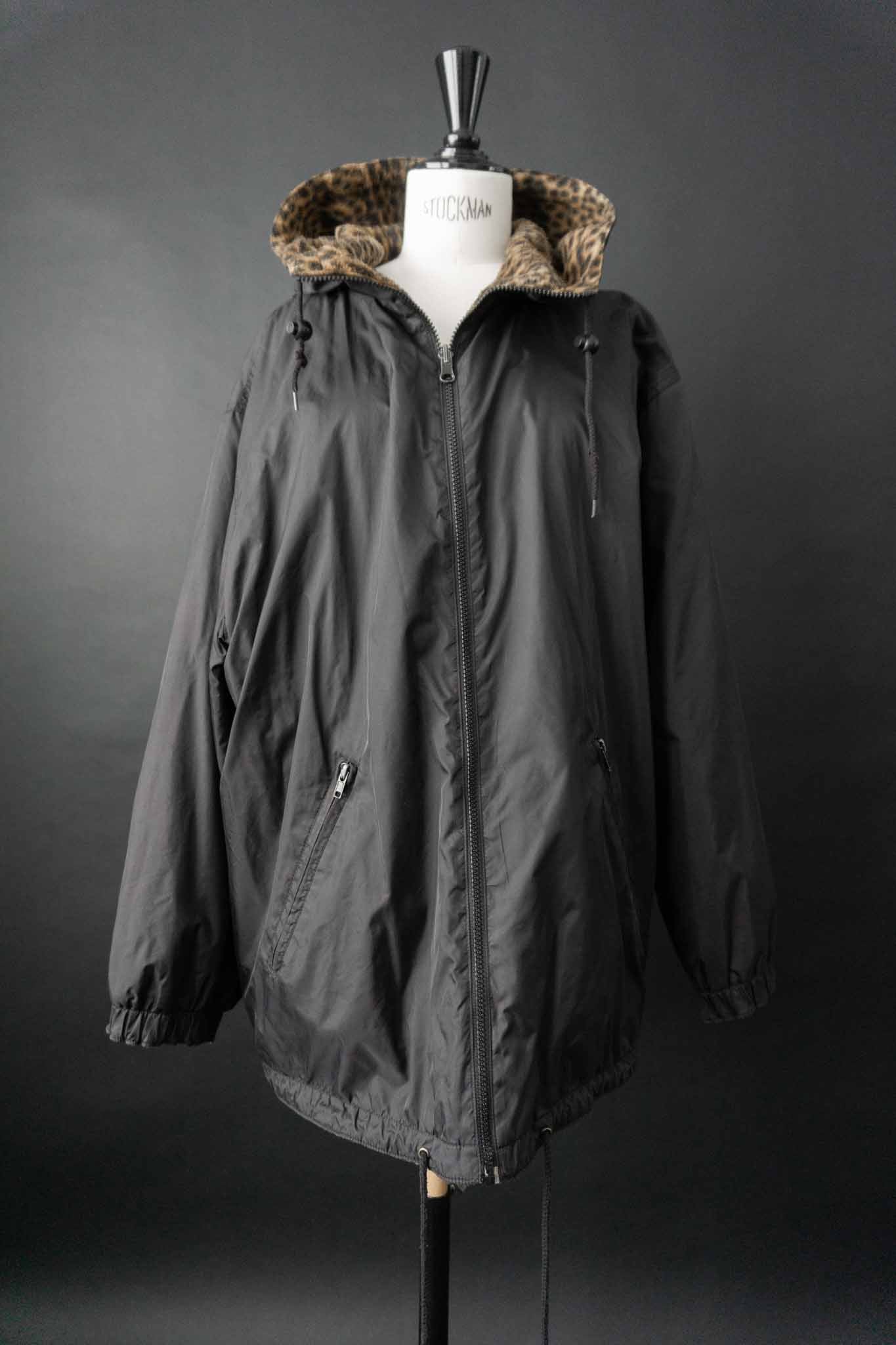 Vintage 80s Wendejacke Schwarz Leopard Fake Fur mit Kapuze und Oversize-Schnitt