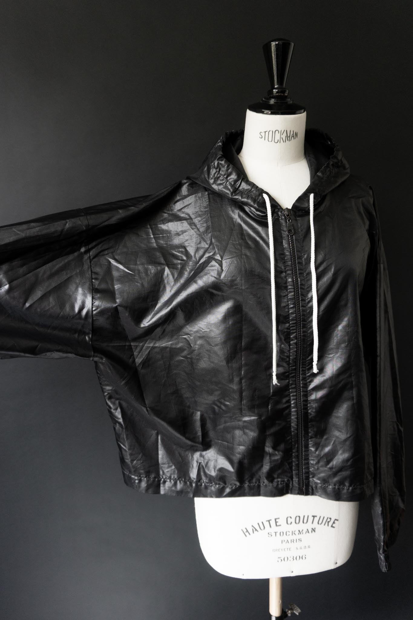 90s Vintage Windjacke in Schwarz mit oversized Silhouette, M–L theplaincircle vintage