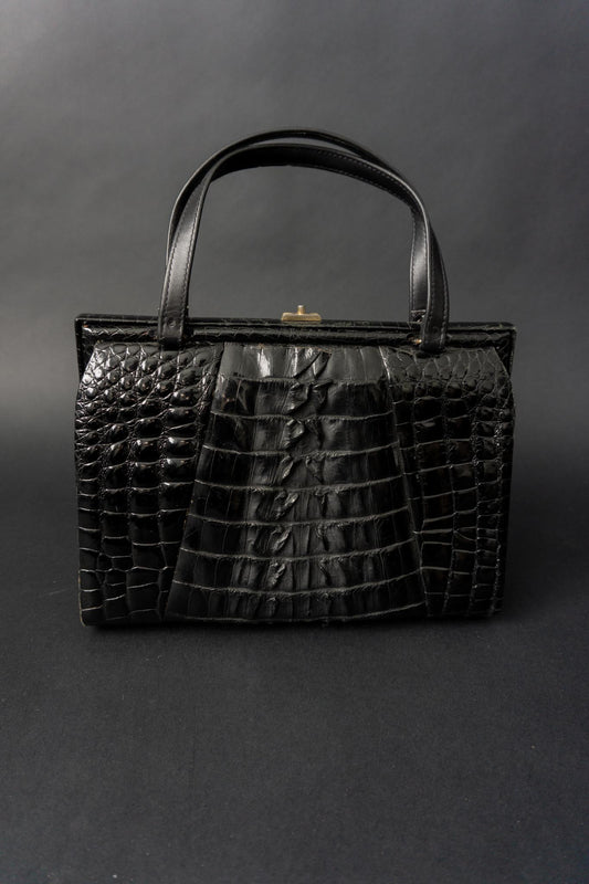Schwarze Vintage Handtasche in Kroko-Optik mit Faltendetail auf der Vorderseite