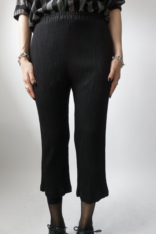 Black pleated trousers